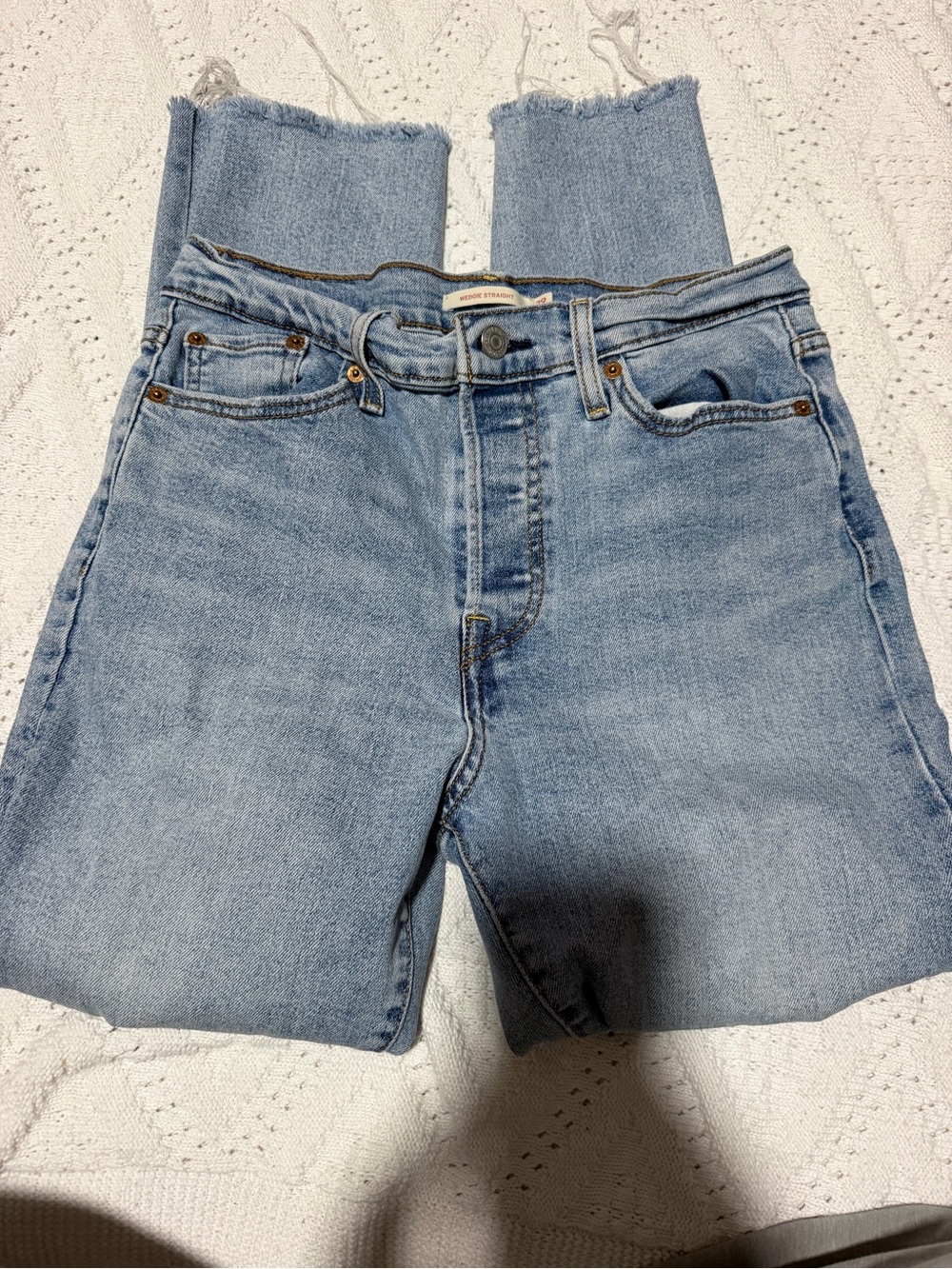 Levi's Light Blue High-Rise Cropped Jeans with Raw Hem